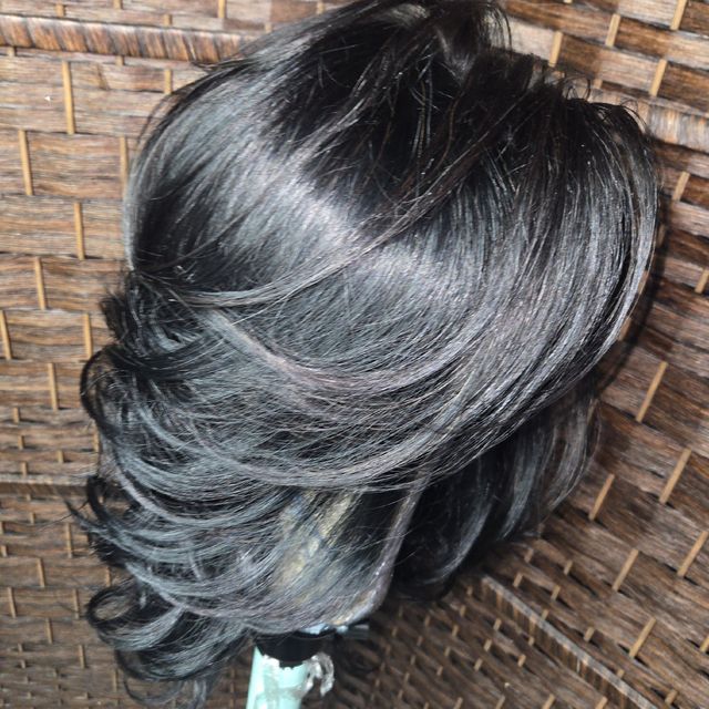 Glossy black feathered layered bob