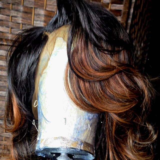 Black-to-copper ombre layered wig unit with soft waves