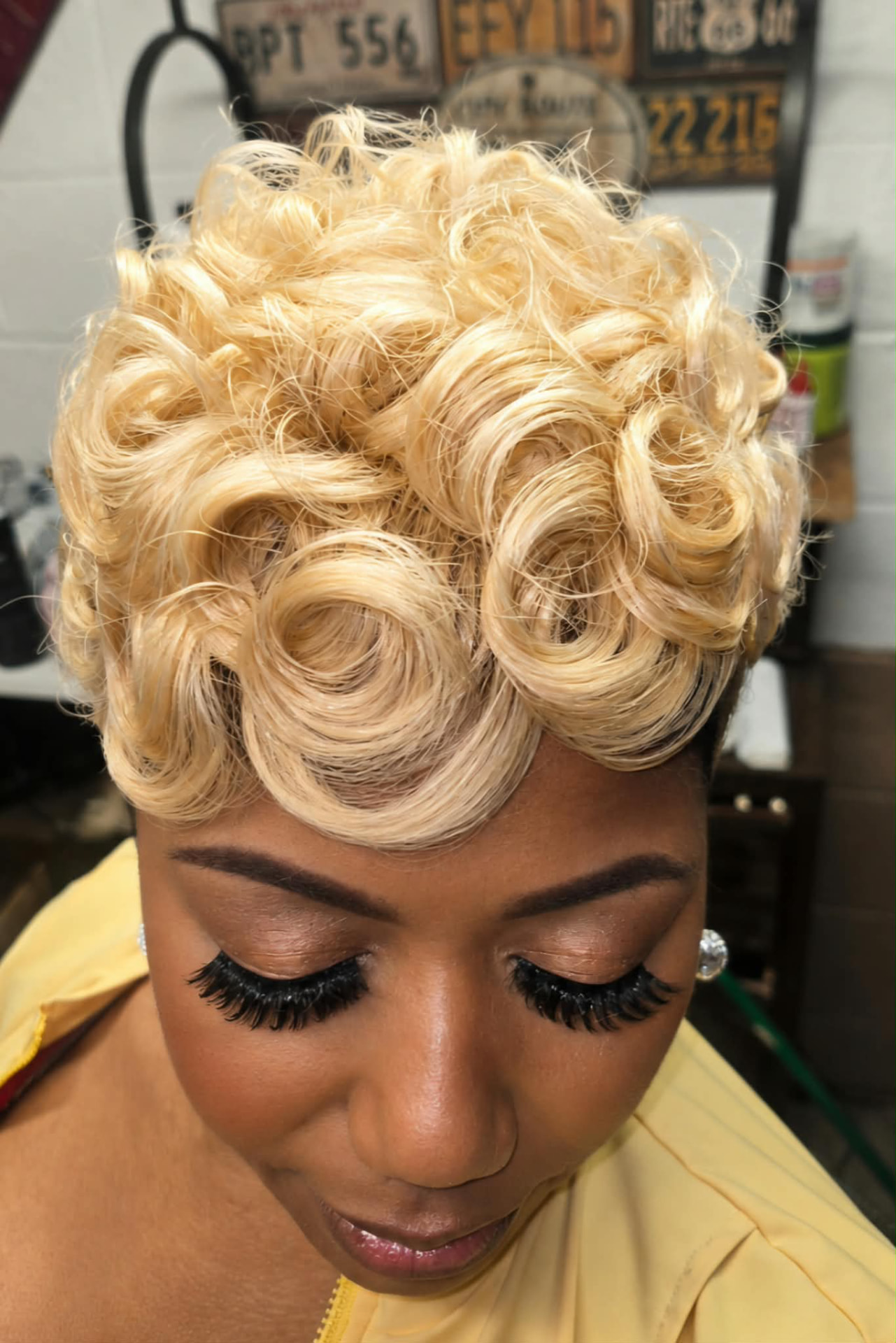 Platinum blonde pin curl pixie styled at HairTamerSalon