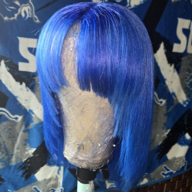 Vivid blue straight bob unit with a full fringe