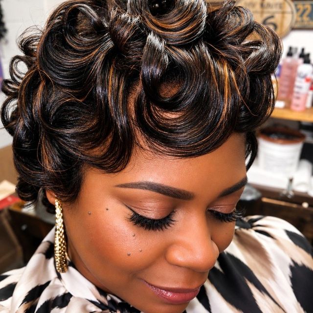Short cut with caramel highlights styled in pin curls